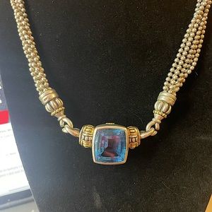 Beautiful Lagos necklace with Blue Topaz pendant enhancer. Enhancer ischangeable